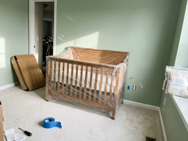 Nursery painted soft green with zero-VOC paint